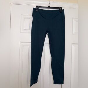 Used leggings size large. Dark teal green/blue. Pilling between the thighs.